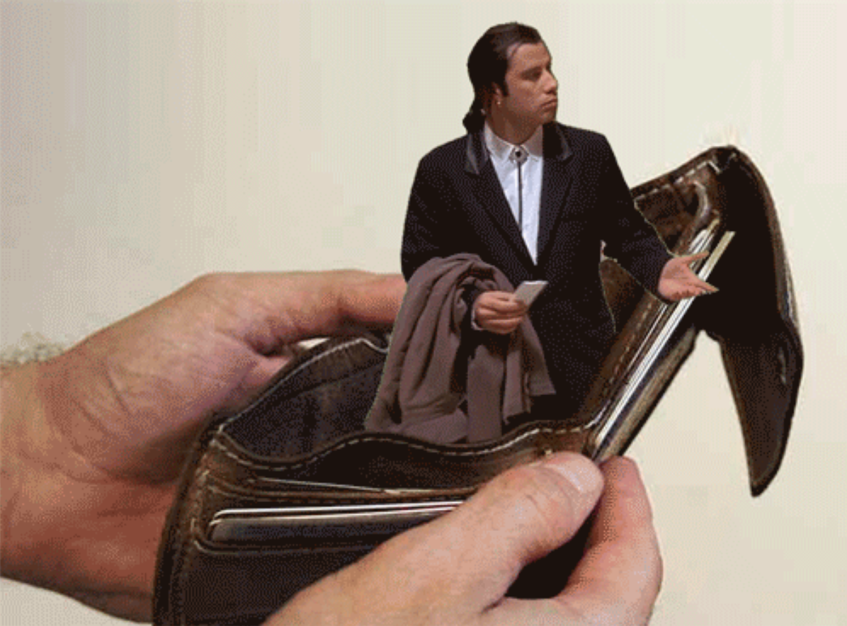 John Travolta wallet meme